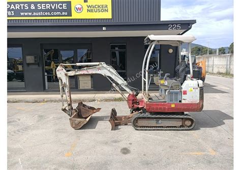 used takeuchi mini bucket